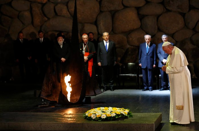 Pope Francis observes a moment of silence after laying a wreath during a ceremony at the Yad Vashem Holocaust memorial in Jerusalem